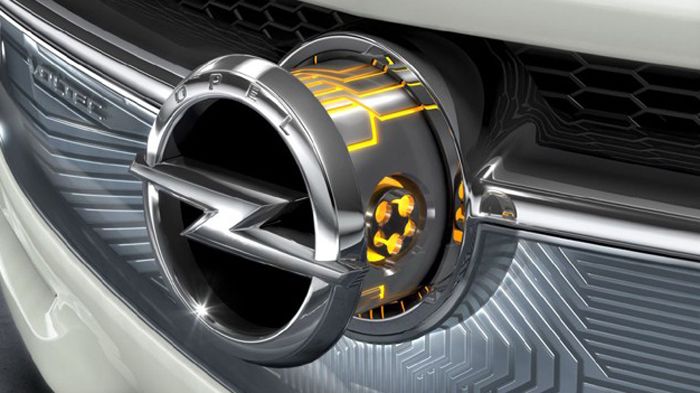 Μια ηλεκτρονικά επεξεργασμένη φωτογραφία αποκαλύπτει ένα ευμέγεθες σήμα της εταιρείας στη μάσκα μπροστά, που παραπέμπει στο Adam και φανερώνει τη νέα 