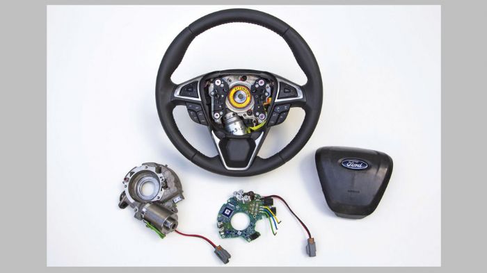 Το σύστημα της Ford χρησιμοποιεί έναν ενεργοποιητή που ελέγχεται με ακρίβεια και τοποθετείται μέσα στο τιμόνι ενώ δεν απαιτεί την οποιαδήποτε αλλαγή σ