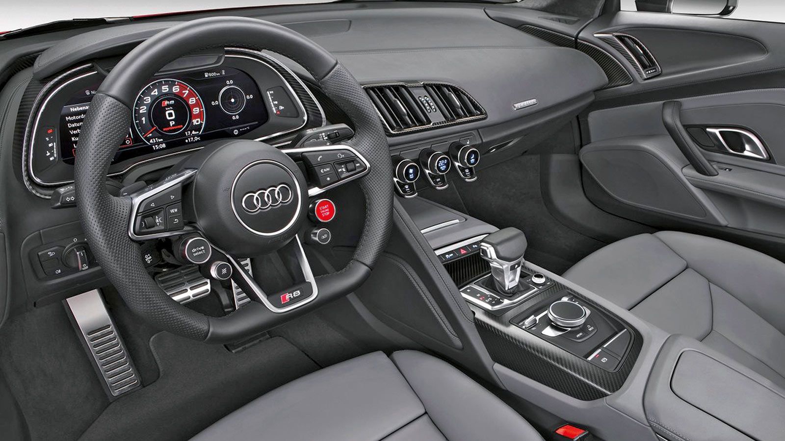 Κορυφαία ποιότητα κατασκευής στο εσωτερικό του R8. Στο τιμόνι βρίσκονται στα κουμπιά του drive select και του performance mode. 
