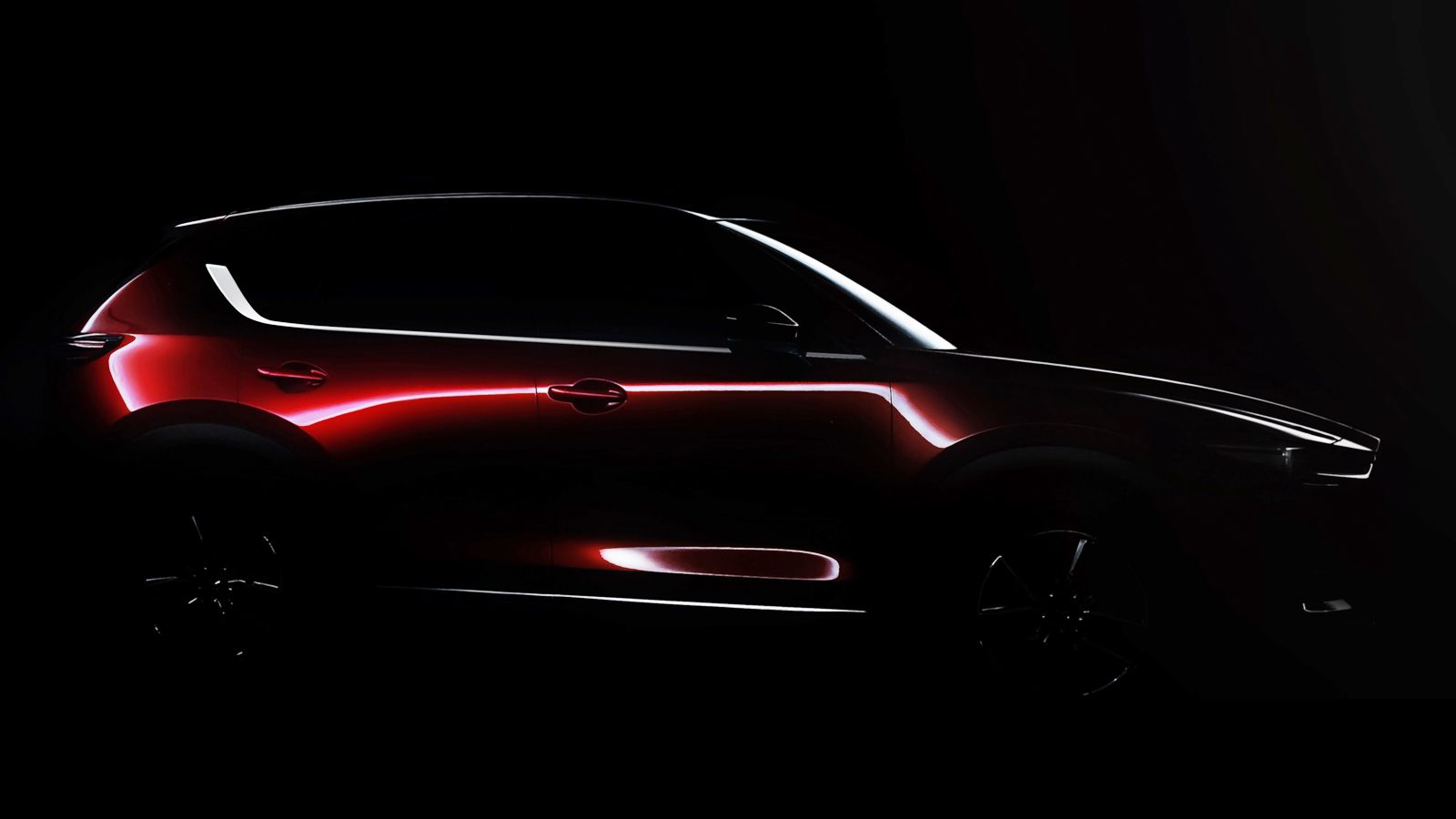 Στη σκοτεινή προωθητική εικόνα του νέου Mazda CX-5, βλέπουμε κάτι σαν το μικρό αδελφό του CX-9, με χαμηλωμένο προφίλ και πιο «σφιχτές» γραμμές.