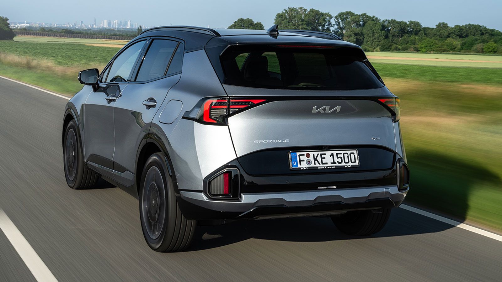 Kia Sportage πίσω εικόνα σε κίνηση
