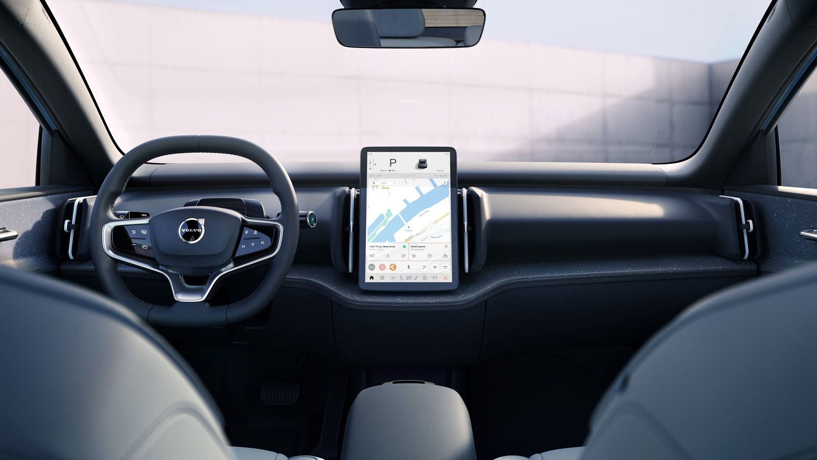Μίνιμαλ λογική που θυμίζει Tesla βλέπουμε στο λιτό εσωτερικό του EX30, όπου η οθόνη έχει κάθετη και όχι οριζόντια διάταξη, απαιτώντας φυσικά και τον α