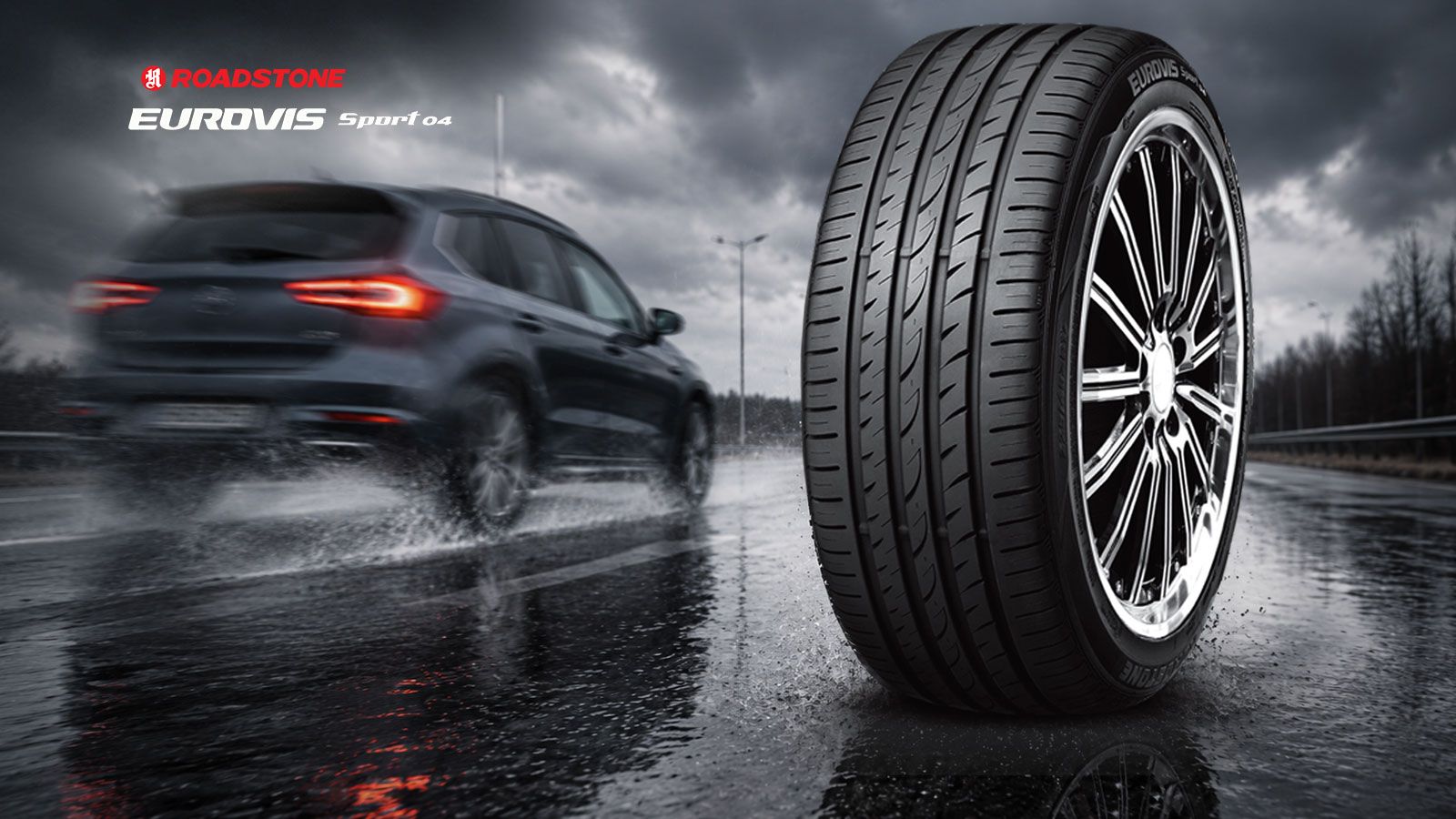 Roadstone Eurovis Sport 04 σε βρεγμένο δρόμο με αυτοκίνητο σε κίνηση