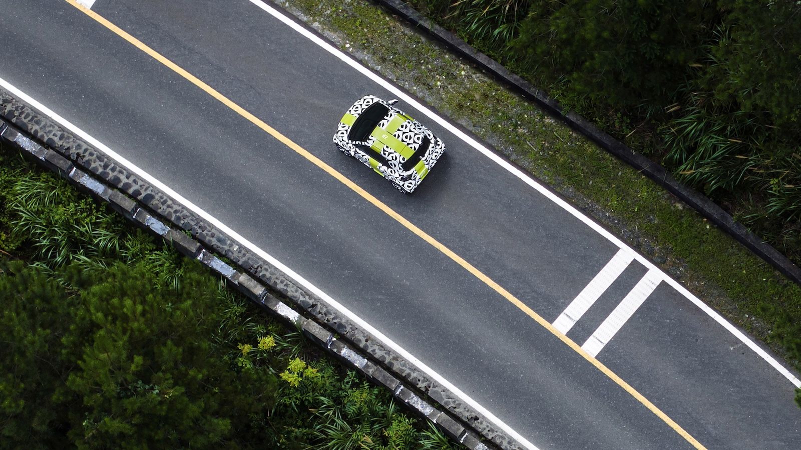 The smart #2 in bespoke camouflage livery designed by the Mercedes-Benz Global Design Team.