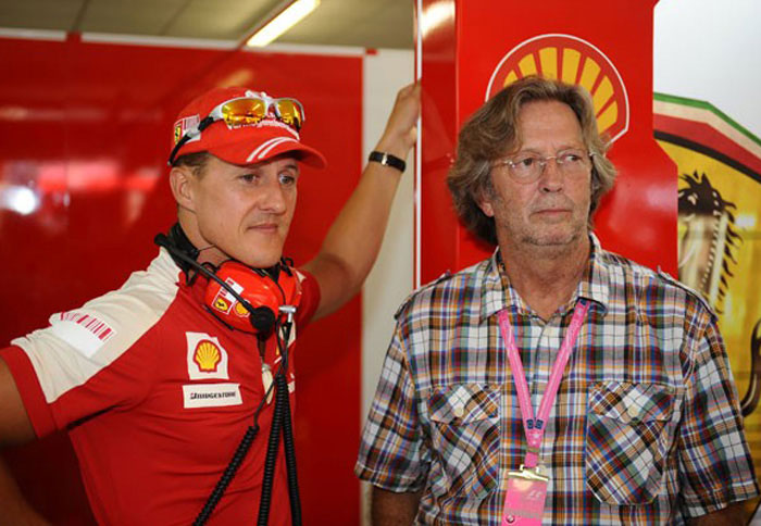 Ο Eric Clapton συνομιλεί με τον Michael Schumacher 